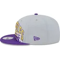 new-era-flat-brim-9fifty-tip-off-2023-los-angeles-lakers-nba-grey-and-purple-snapback-cap