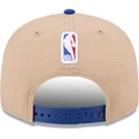 new-era-flat-brim-9fifty-draft-2024-nba-brown-and-blue-snapback-cap