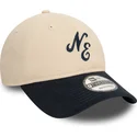 new-era-curved-brim-9twenty-peached-cotton-beige-and-navy-blue-adjustable-cap