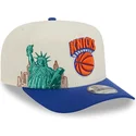 new-era-curved-brim-9fifty-a-frame-precurved-hardwood-classics-new-york-knicks-nba-beige-and-blue-snapback-cap